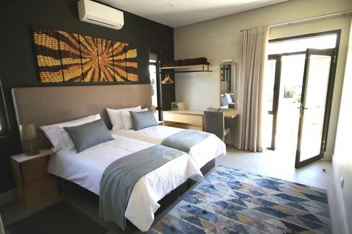 Imagen de la habitación del Hotel The Elegant Guesthouse. Foto 10