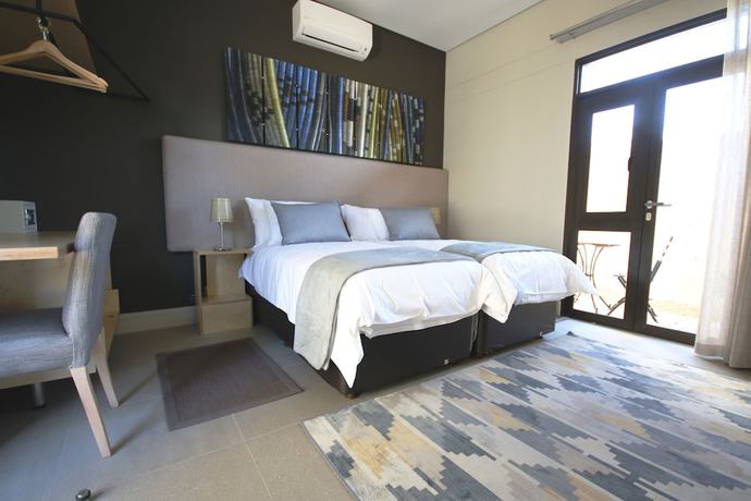 Imagen de la habitación del Hotel The Elegant Guesthouse. Foto 17