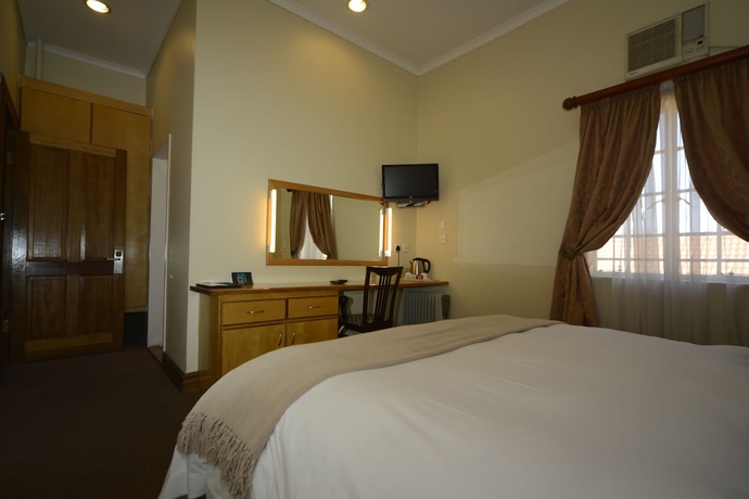 Imagen de la habitación del Hotel The Elegant Lodge. Foto 5