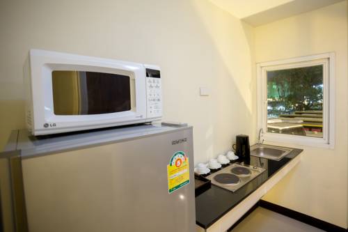 Imagen de la habitación del Hotel The Elegant Patong. Foto 5