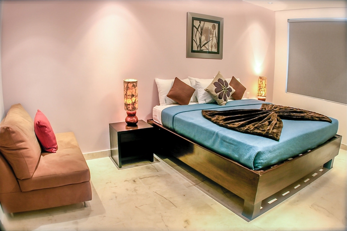 Imagen de la habitación del Hotel The Elements Oceanfront and Beachside Condo. Foto 2