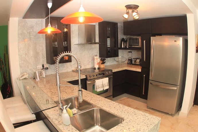 Imagen de la habitación del Hotel The Elements Oceanfront and Beachside Condo. Foto 8