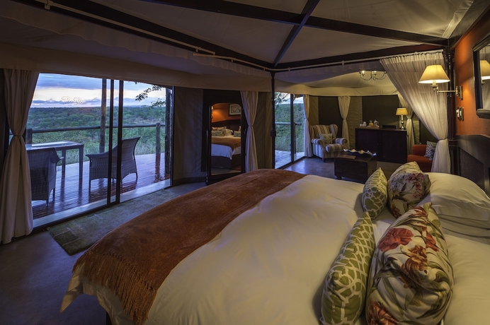 Imagen de la habitación del Hotel The Elephant Camp. Foto 3