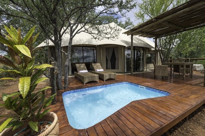 Imagen de la habitación del Hotel The Elephant Camp. Foto 5