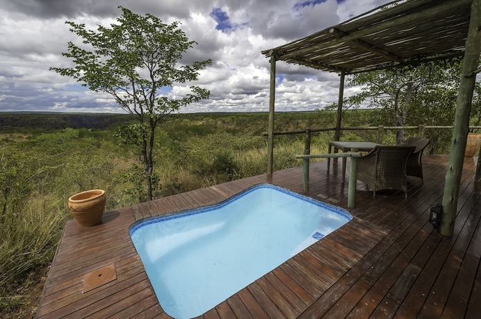 Imagen de la habitación del Hotel The Elephant Camp. Foto 6