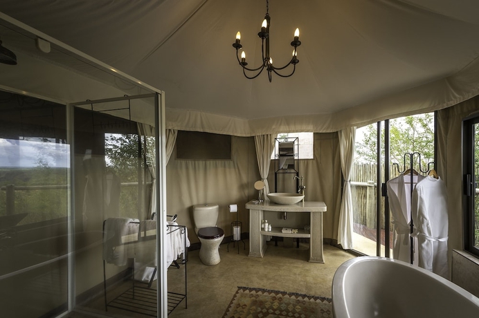 Imagen de la habitación del Hotel The Elephant Camp. Foto 11