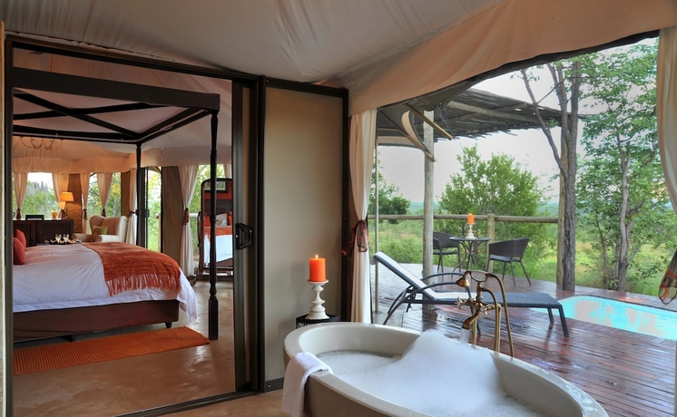 Imagen de la habitación del Hotel The Elephant Camp. Foto 12