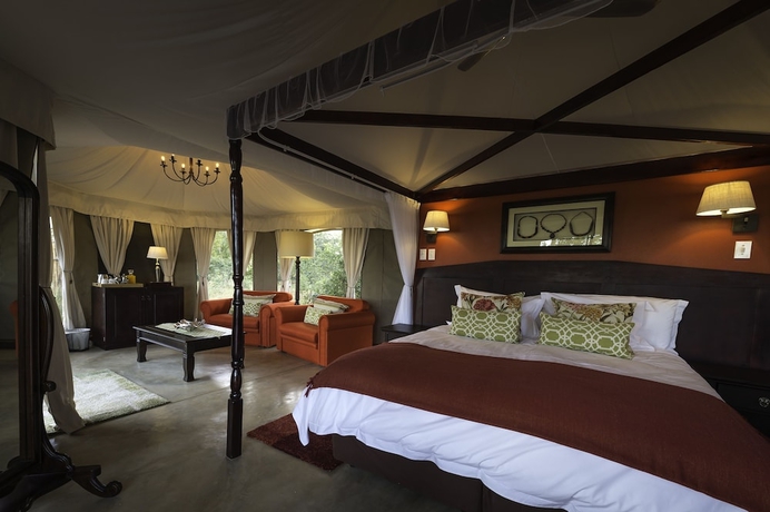 Imagen de la habitación del Hotel The Elephant Camp. Foto 18