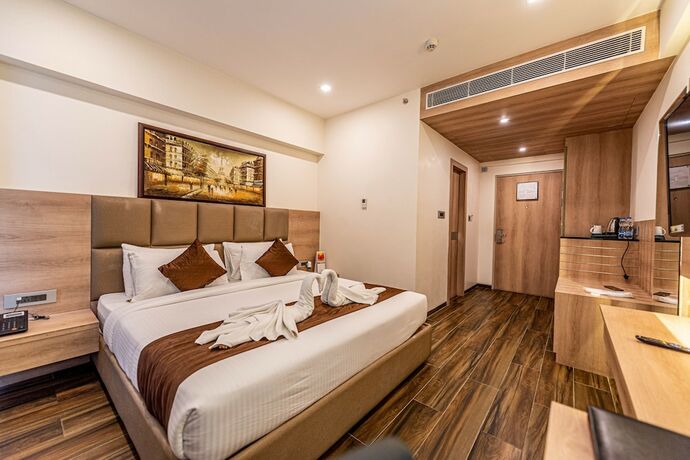 Imagen de la habitación del Hotel The Elite Lucknow. Foto 10