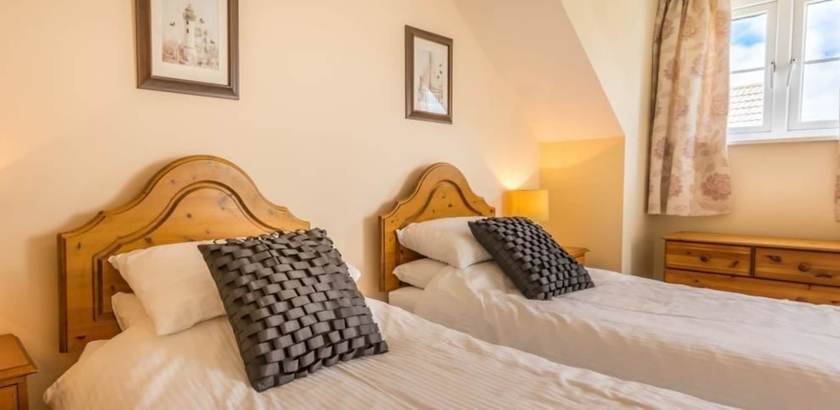 Imagen de la habitación del Hotel The Ellingham Cottages. Foto 3