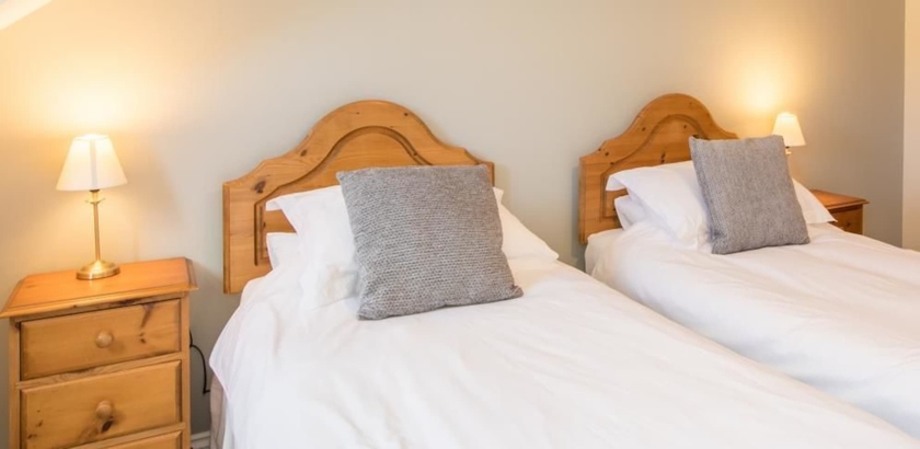 Imagen de la habitación del Hotel The Ellingham Cottages. Foto 9