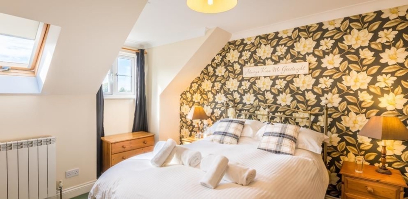 Imagen de la habitación del Hotel The Ellingham Cottages. Foto 11