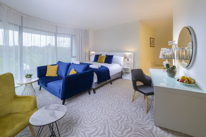 Imagen de la habitación del Hotel The Ellison. Foto 5