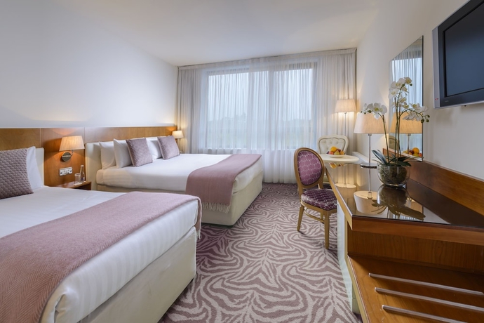 Imagen de la habitación del Hotel The Ellison. Foto 7