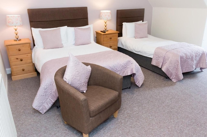 Imagen de la habitación del Hotel The Elm House. Foto 3