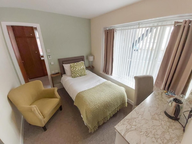 Imagen de la habitación del Hotel The Elm House. Foto 5