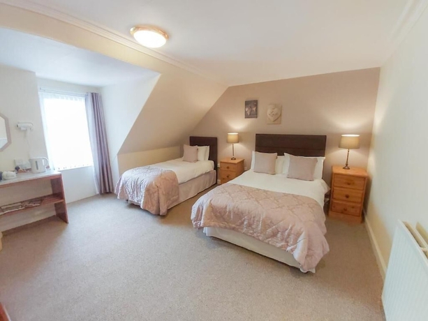 Imagen de la habitación del Hotel The Elm House. Foto 13