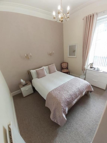 Imagen de la habitación del Hotel The Elm House. Foto 14