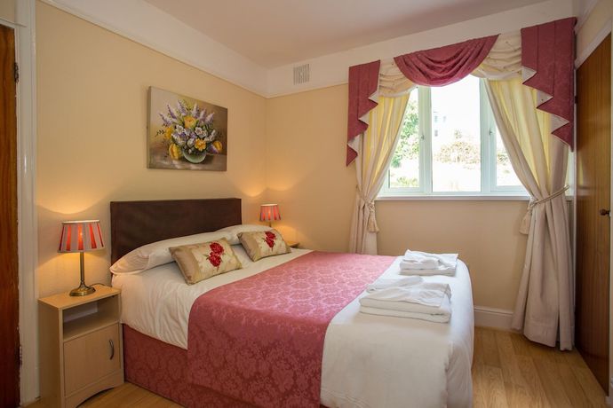 Imagen de la habitación del Hotel The Elmington. Foto 10