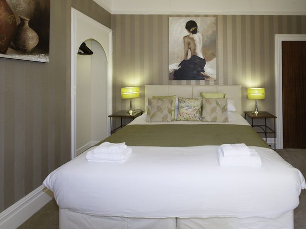 Imagen de la habitación del Hotel The Elmington. Foto 16