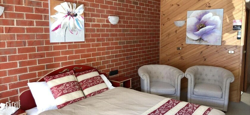 Imagen de la habitación del Hotel The Elms Motor Inn. Foto 19