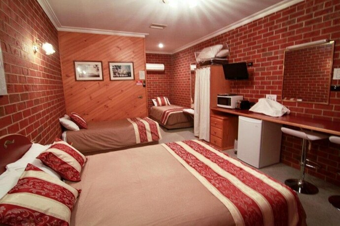 Imagen de la habitación del Hotel The Elms Motor Inn. Foto 20