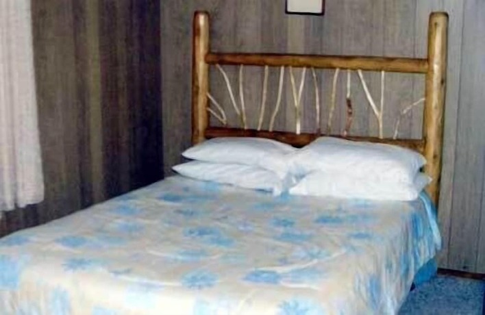 Imagen de la habitación del Hotel The Elms Waterfront Cottages. Foto 6