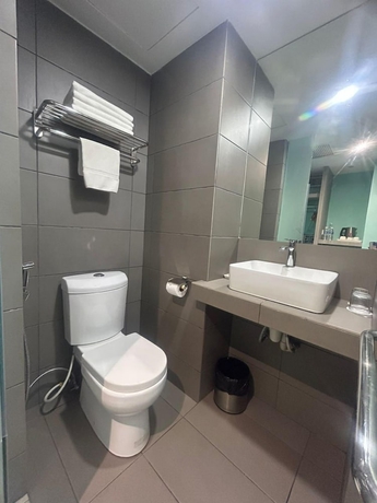 Imagen de la habitación del Hotel The Elopura. Foto 9