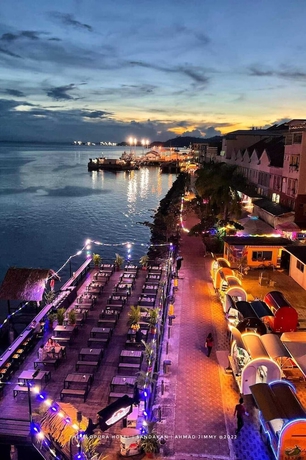 Imagen del bar/restaurante del Hotel The Elopura. Foto 7