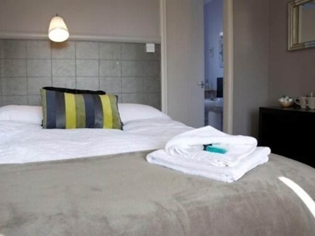 Imagen de la habitación del Hotel The Eltisley. Foto 13