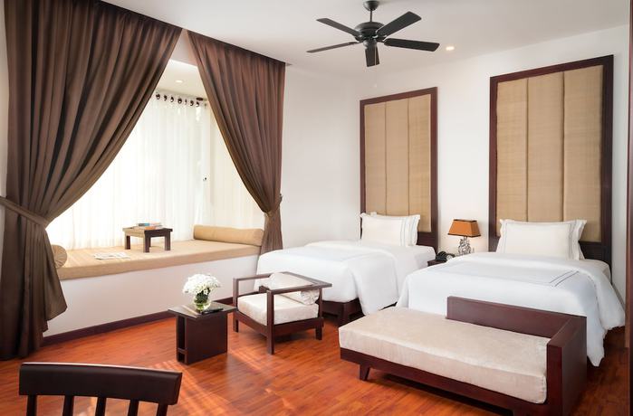 Imagen de la habitación del Hotel The Embassy Angkor Resort and Spa. Foto 9