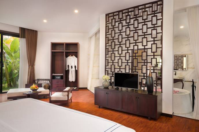 Imagen de la habitación del Hotel The Embassy Angkor Resort and Spa. Foto 11