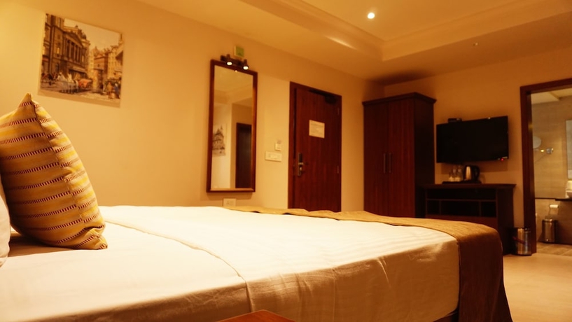 Imagen de la habitación del Hotel The Emerald Club. Foto 9