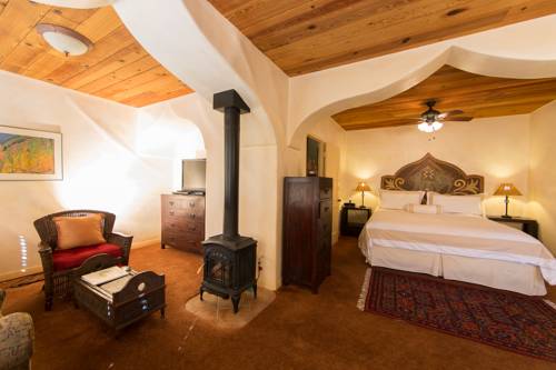Imagen de la habitación del Hotel The Emerald Iguana Inn. Foto 2