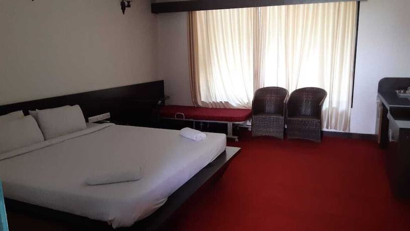 Imagen de la habitación del Hotel The Emerald Resort, Pune. Foto 10