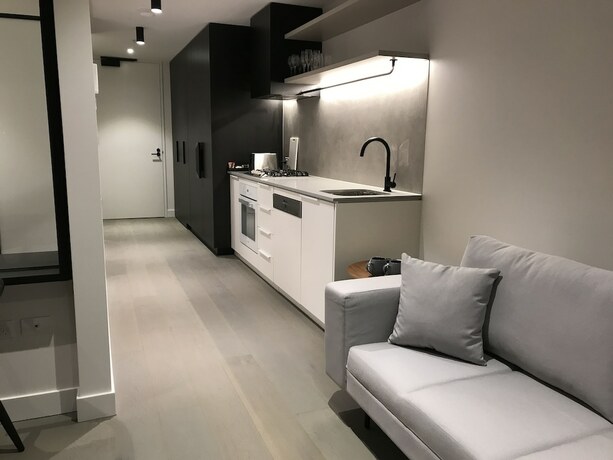 Imagen de la habitación del Hotel The Eminence Apartments By Cllix. Foto 19