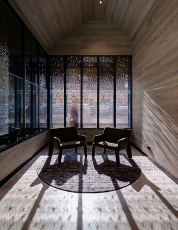 Imagen de los interiores del Hotel The Eminence Apartments By Cllix. Foto 39
