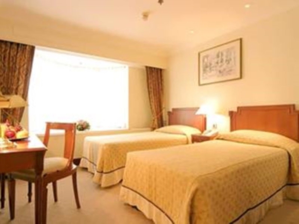 Imagen de la habitación del Hotel The Emperor. Foto 6