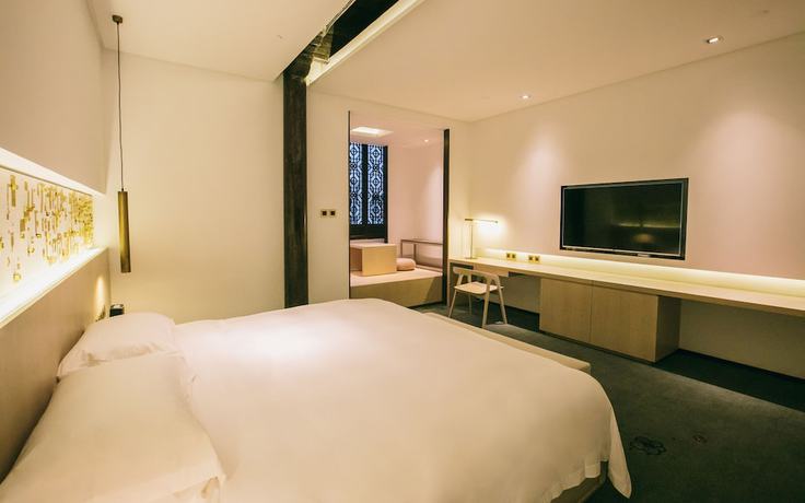 Imagen de la habitación del Hotel The Emperor Suzhou. Foto 3