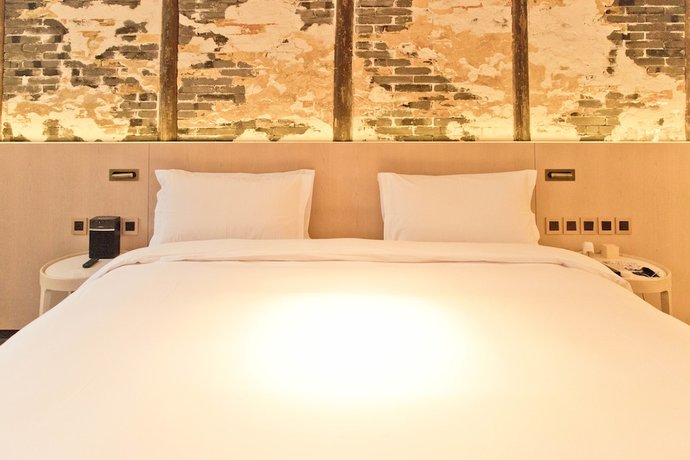 Imagen de la habitación del Hotel The Emperor Suzhou. Foto 14