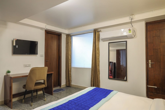 Imagen de la habitación del Hotel The Empire Near Dlf Golf course. Foto 2