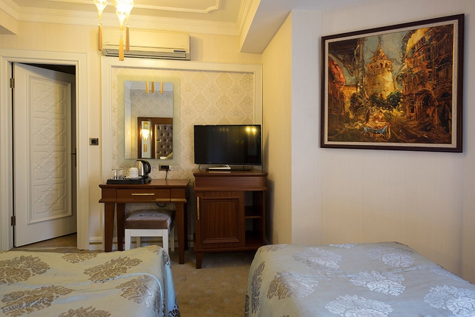 Imagen de la habitación del Hotel The Empress Theodora. Foto 10