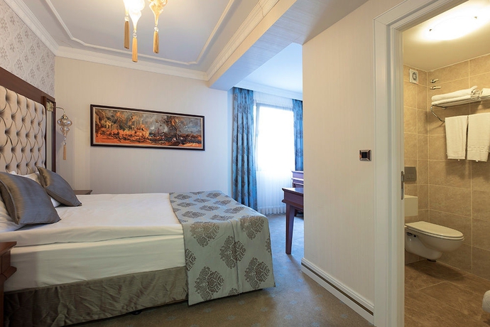 Imagen de la habitación del Hotel The Empress Theodora. Foto 11