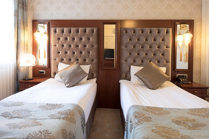 Imagen de la habitación del Hotel The Empress Theodora. Foto 12