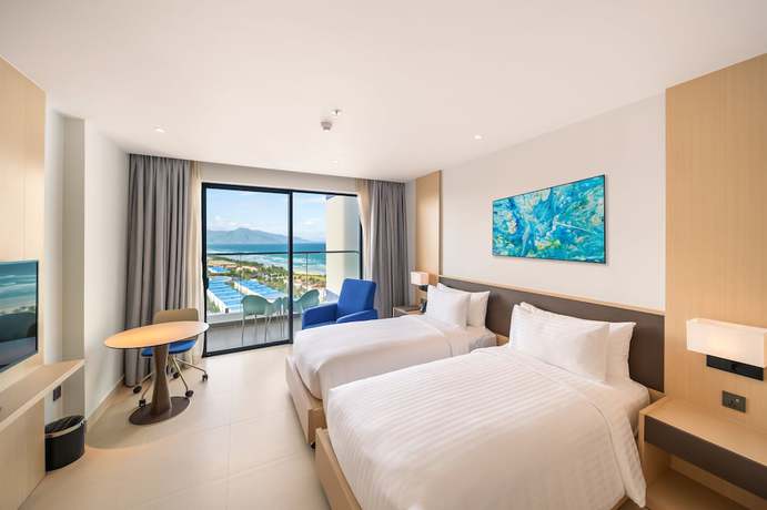Imagen de la habitación del Hotel The Empyrean Cam Ranh Beach Resort. Foto 3