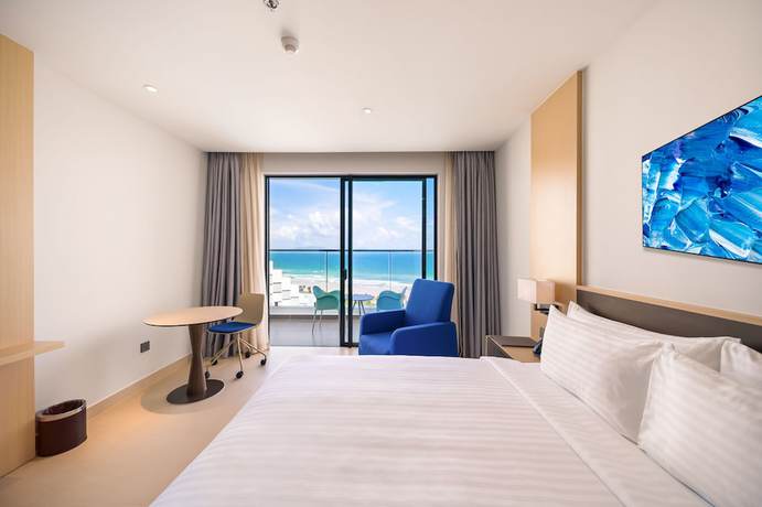 Imagen de la habitación del Hotel The Empyrean Cam Ranh Beach Resort. Foto 5