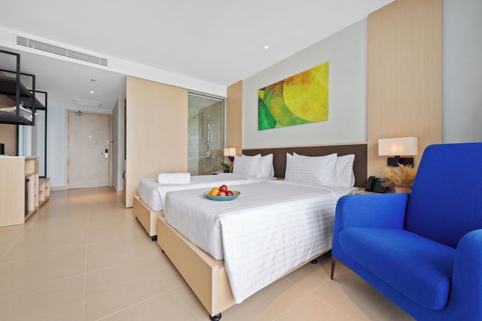 Imagen de la habitación del Hotel The Empyrean Cam Ranh Beach Resort. Foto 12
