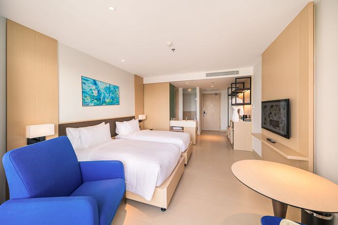 Imagen de la habitación del Hotel The Empyrean Cam Ranh Beach Resort. Foto 13