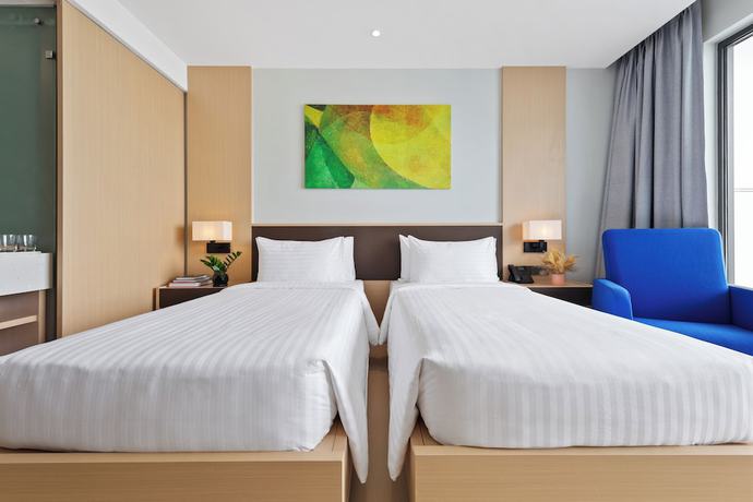 Imagen de la habitación del Hotel The Empyrean Cam Ranh Beach Resort. Foto 17