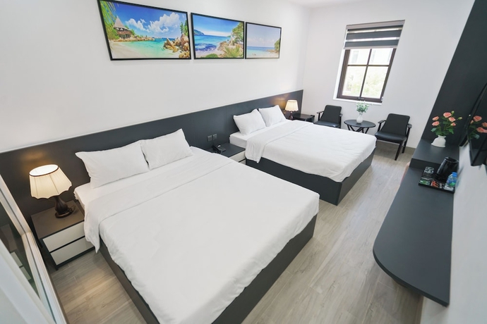 Imagen de la habitación del Hotel The Enchanted Ha Long - Bai Chay Beach. Foto 3
